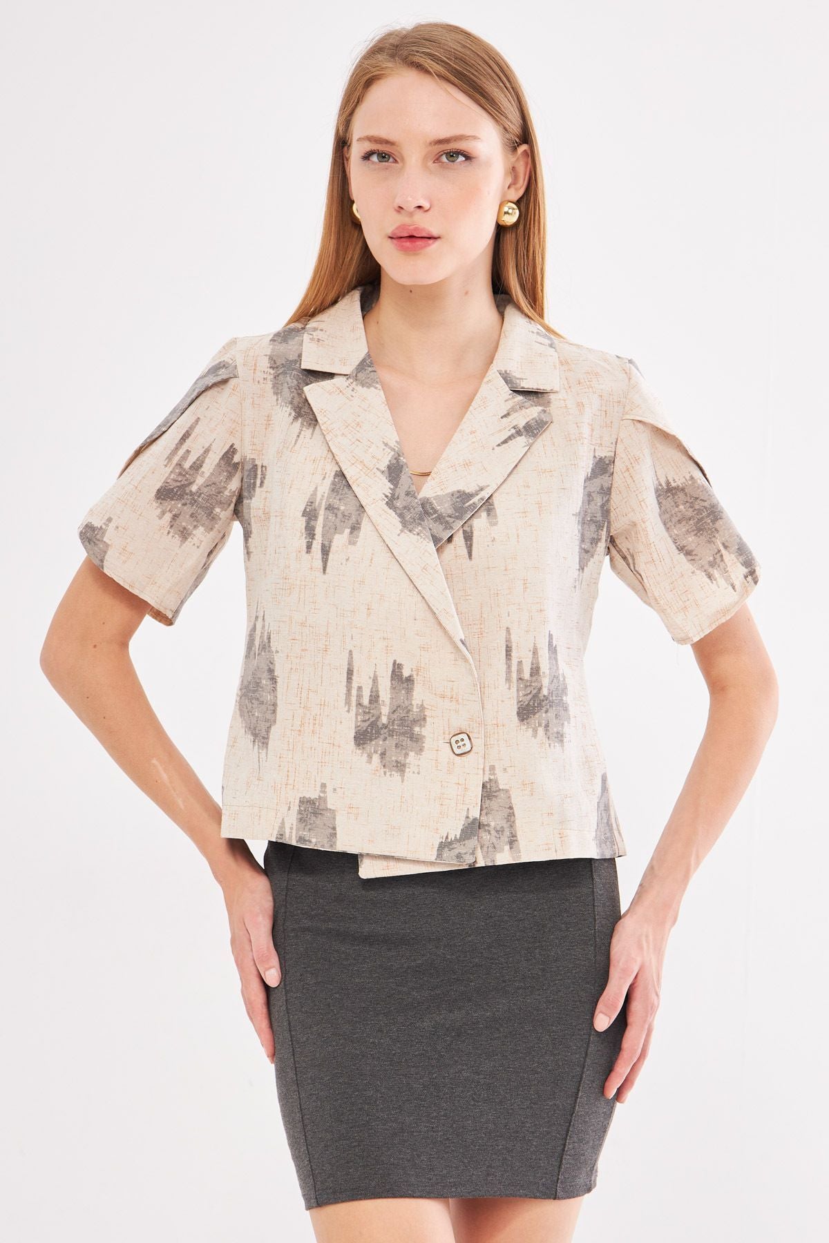 Female smoked linen looking patterned arm slit and short sleeve jacket ARM-24Y001095