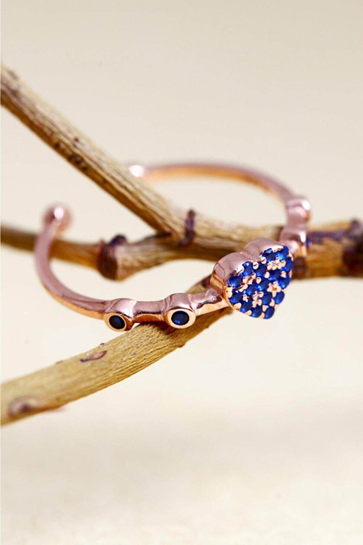 Navy blue stone with heart motif adjustable 14 k rose gold plated woman ring