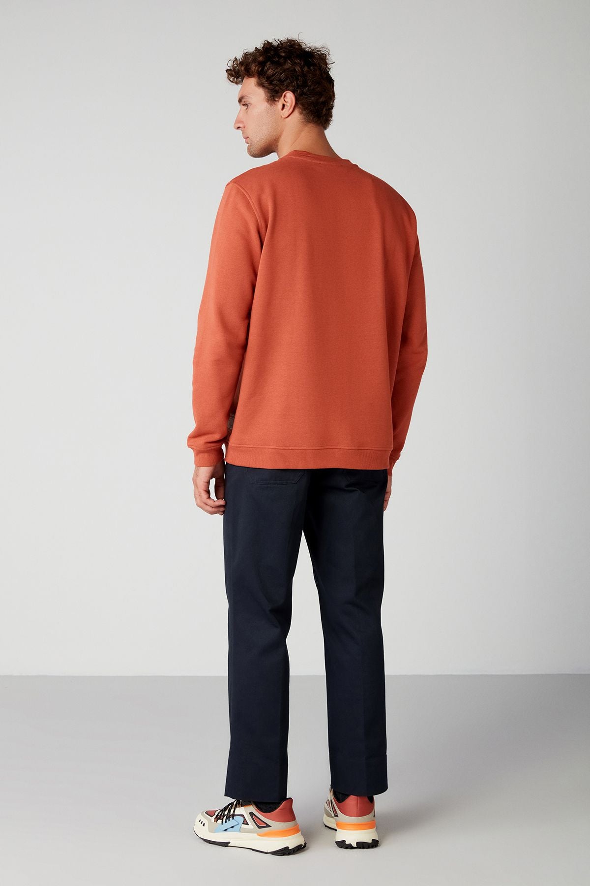 Travis Men's soft fabric regular fit round collar orange sweatshirt