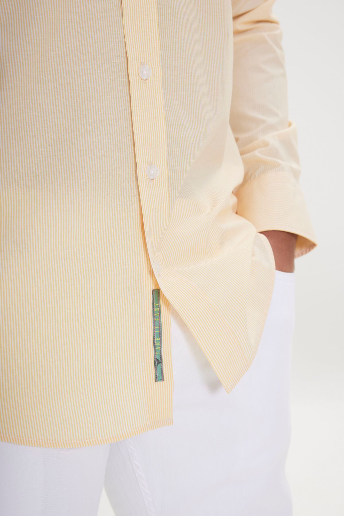 Men's white-yellow slim fit narrow cut hidden buttoned collar cotton striped shirt