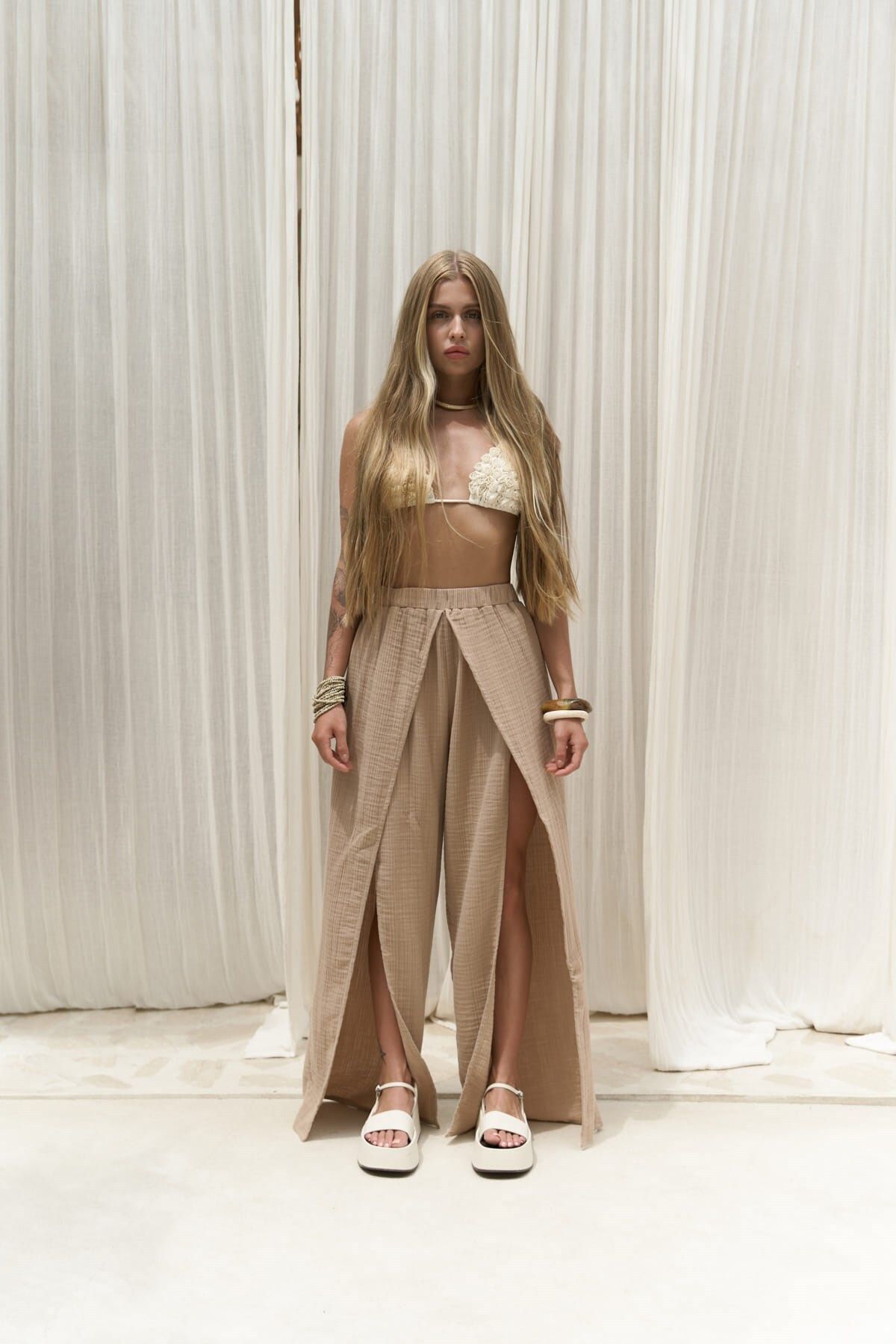 Bima slit detailed mink trousers