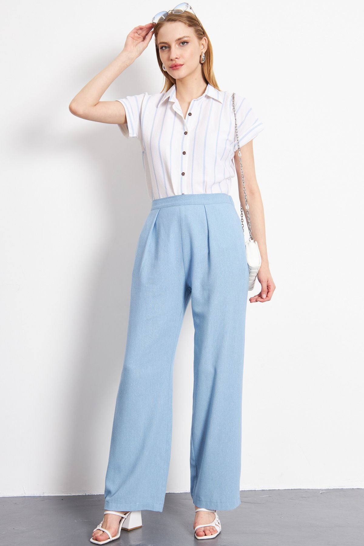 Woman Baby Blue Linen-looking pocket Palazzo Trousers ARM-24Y001070