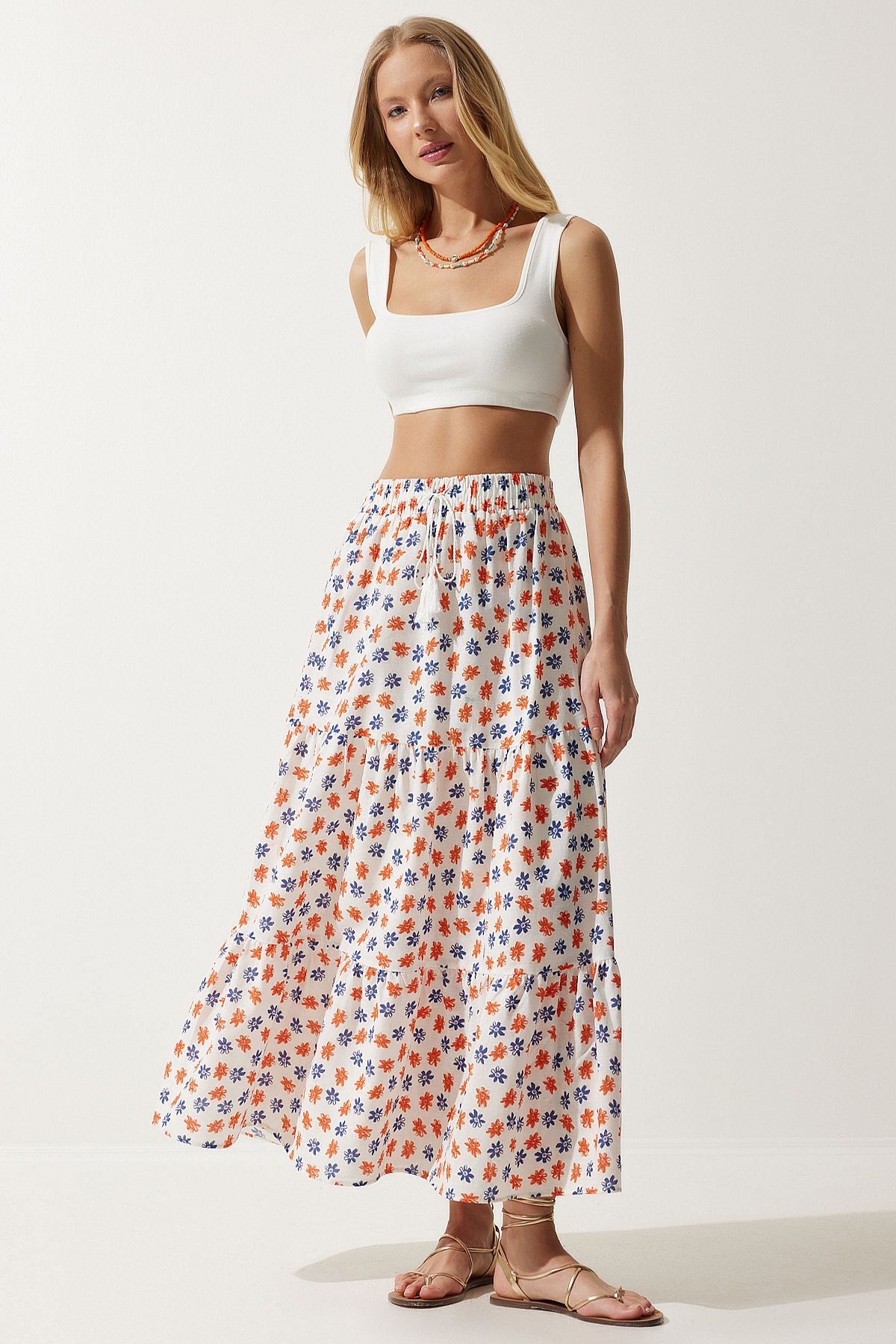 Female ecru oranj floral patterned flywheel
