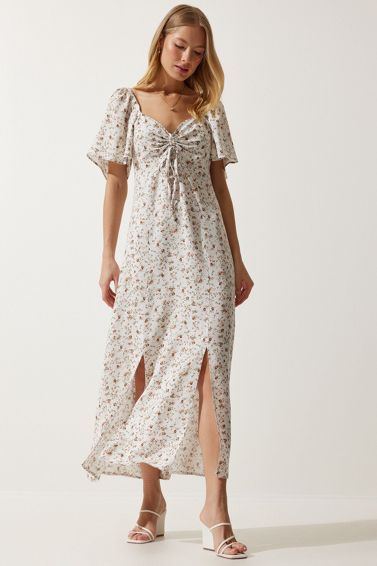 Female ecru slit detailed flywheel viscose dress ub00247