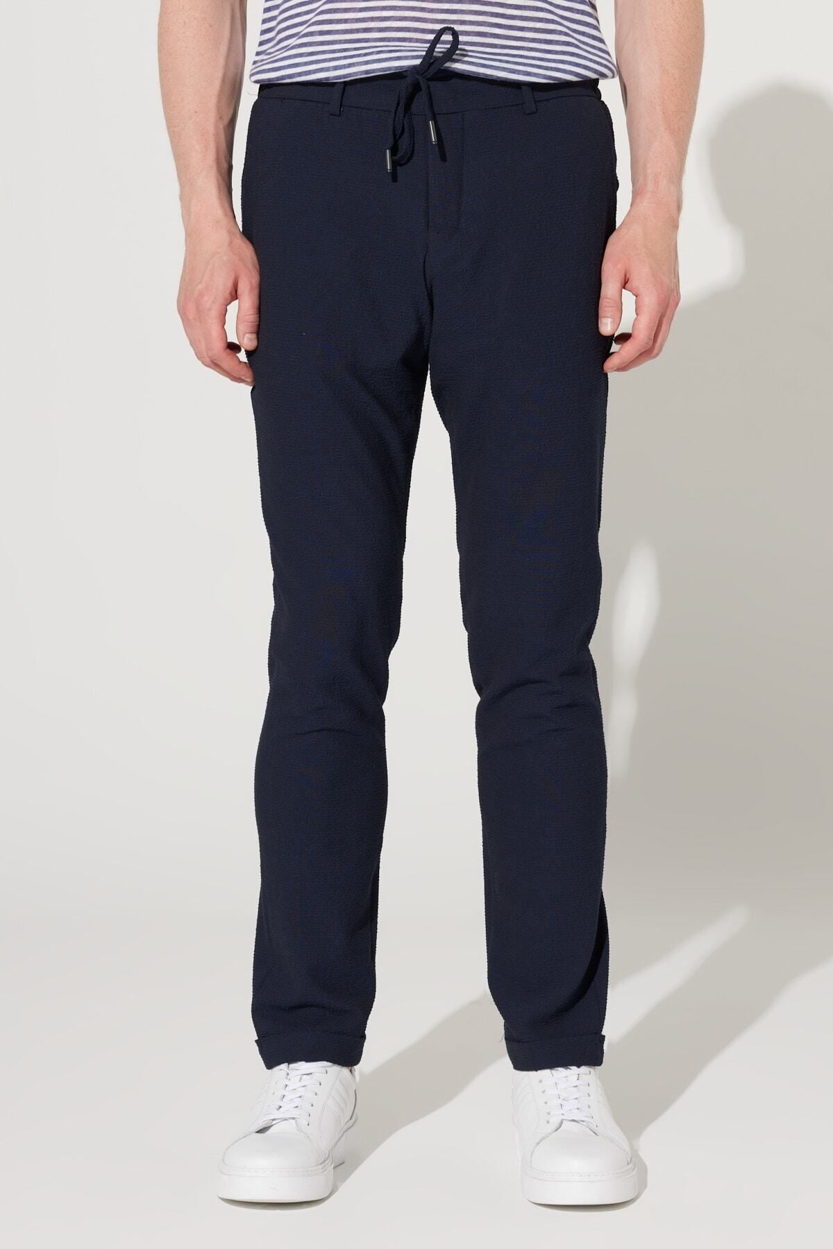 Men's navy blue slim fit narrow -cut wafer patterned flexible waist tied trousers