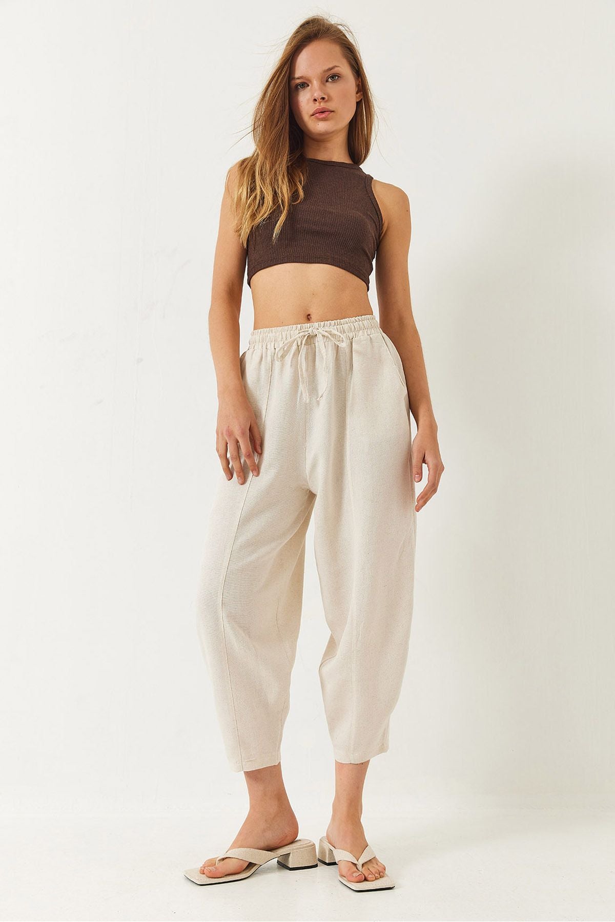 Women's waist elapsed pocket detailed shalwar cut pants 60261456