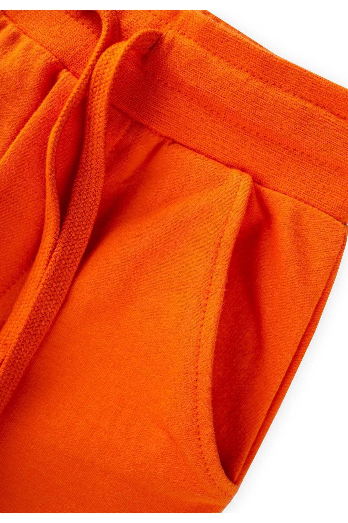 Partly tracksuit 3-9 years orange