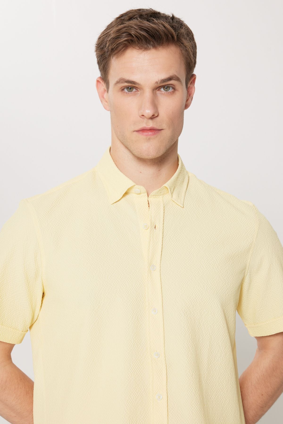 Men's yellow slim fit narrow cut hidden button collar short sleeve shirt