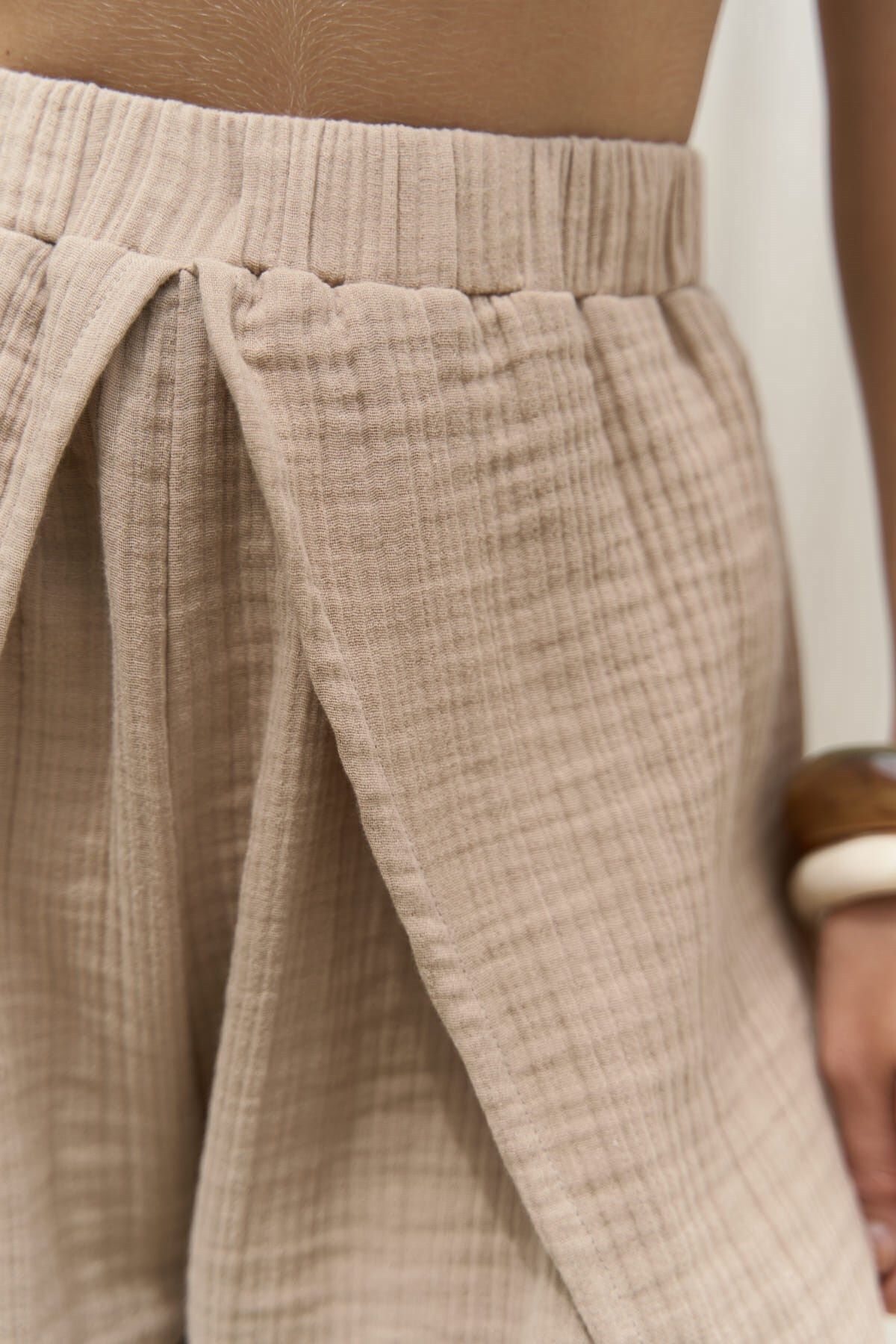 Bima slit detailed mink trousers
