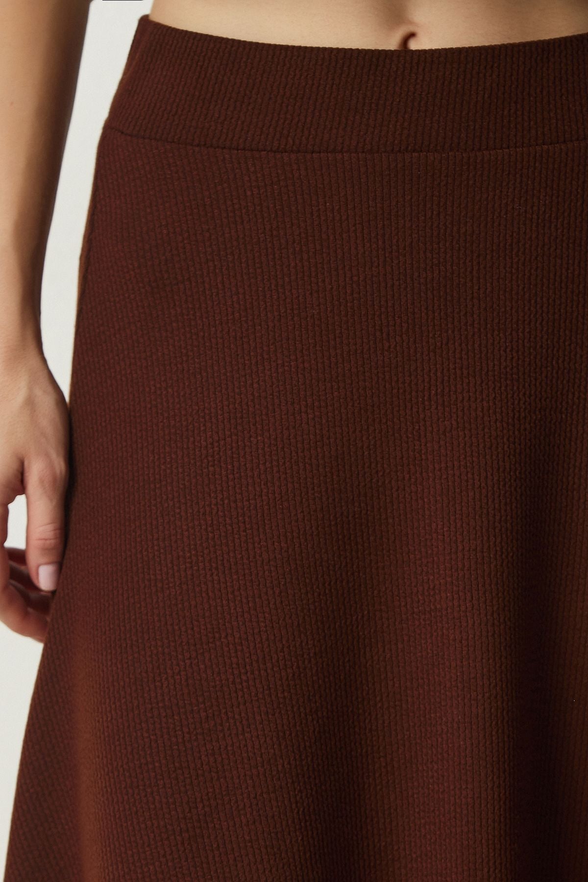 Female brown asymmetrical cut wick knitted skirt MC00227