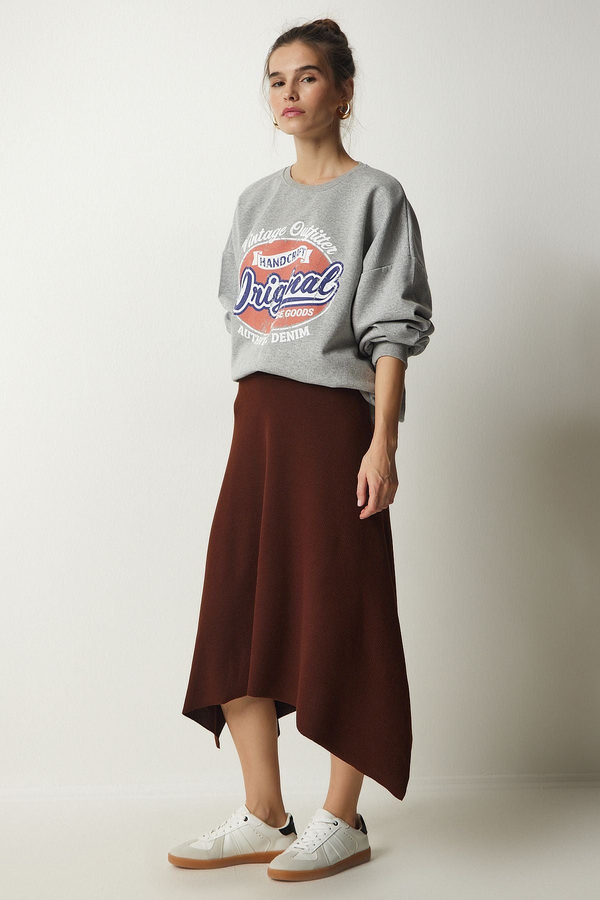Female brown asymmetrical cut wick knitted skirt MC00227