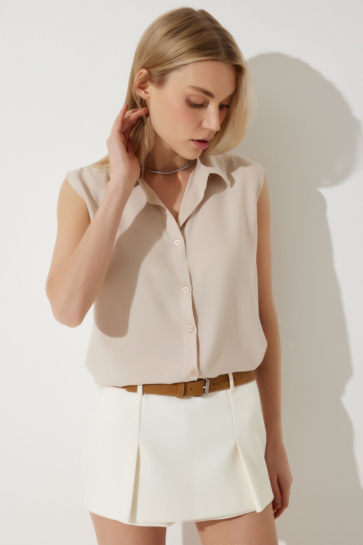 Women's Cream Sleeveless viscose shirt to00129