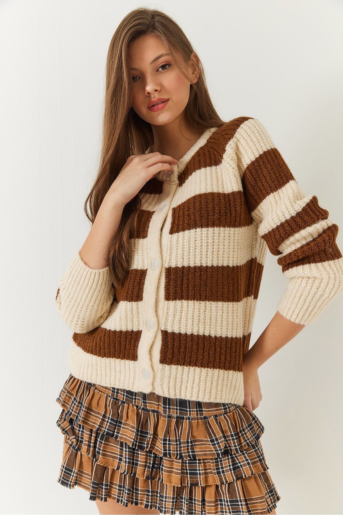 Female striped buttoned knitwear cardigan