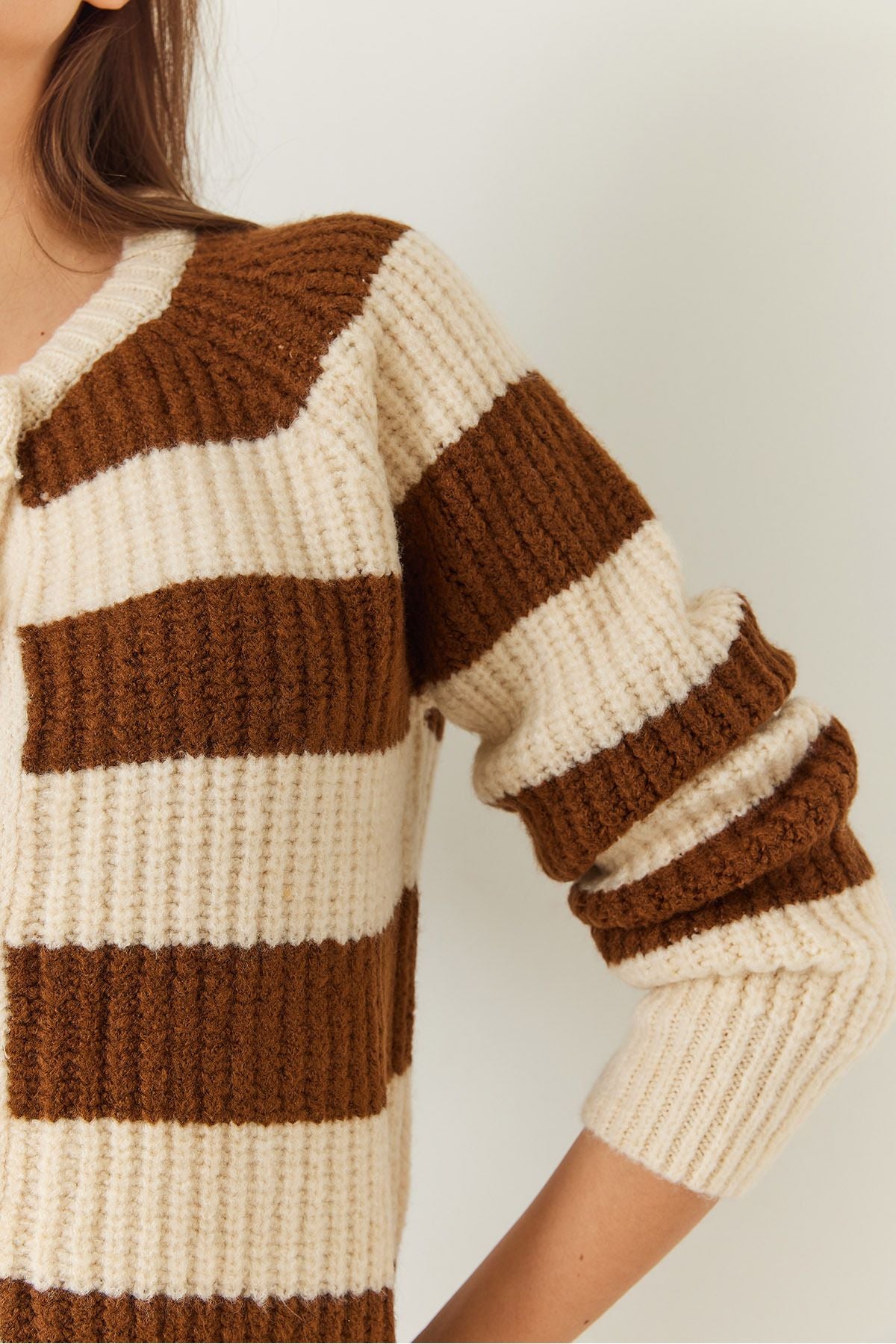 Female striped buttoned knitwear cardigan