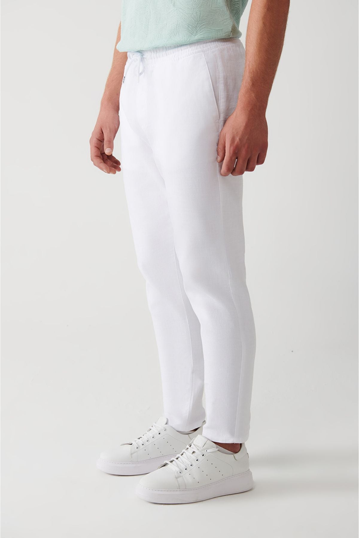 Men's white side pocket waist waist rubber linen textured pants E003052