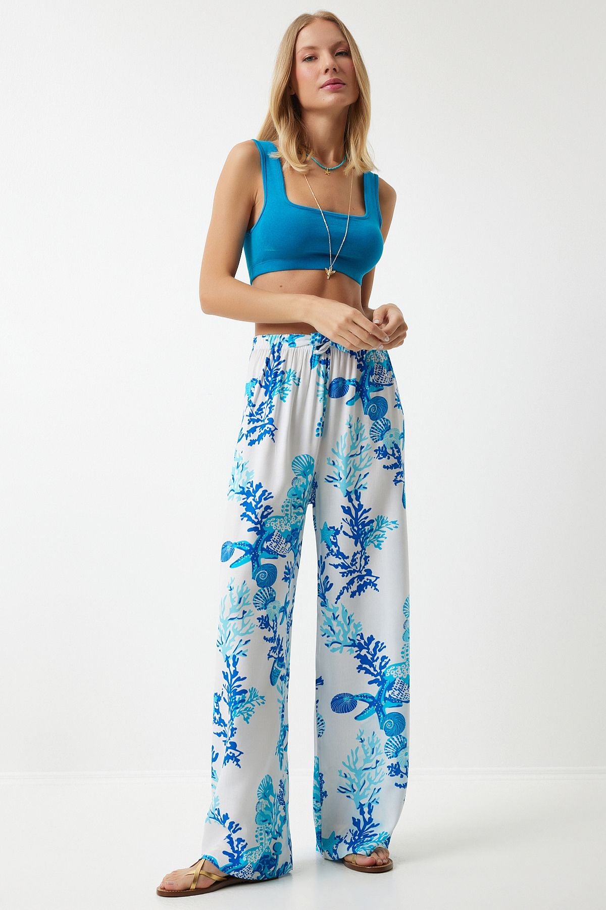 Woman Sky Blue and White Patterned Viscose Palazzo Pants EN00606