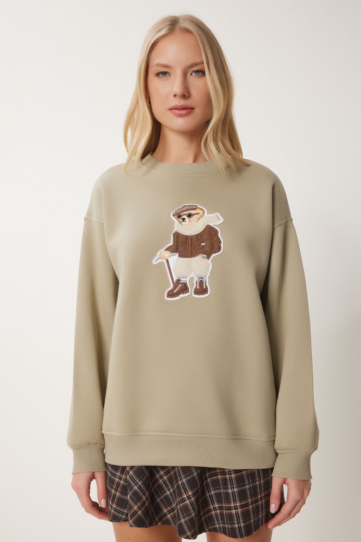 Women's clay green teddy bear armed