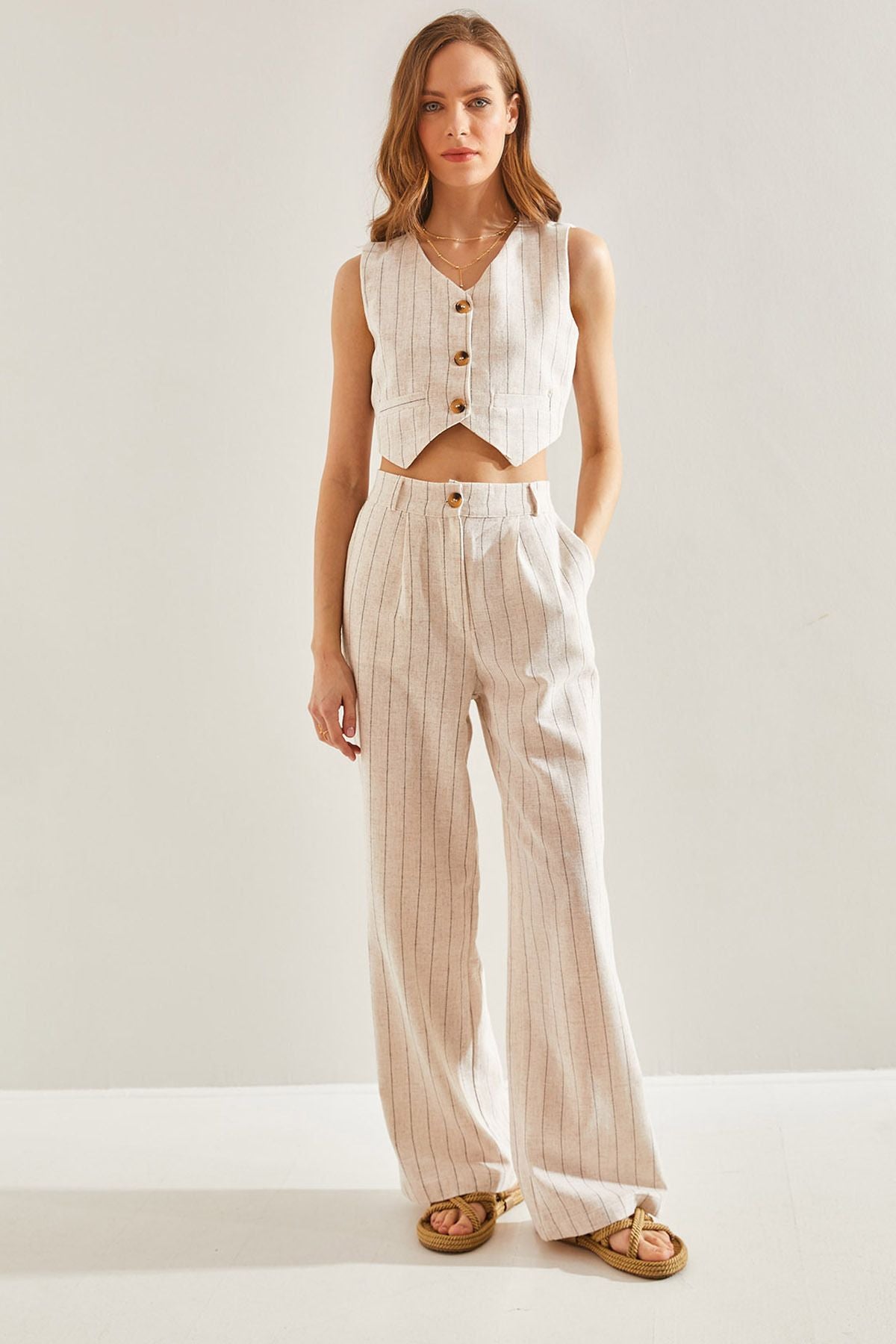 Blower with a woman striped vest