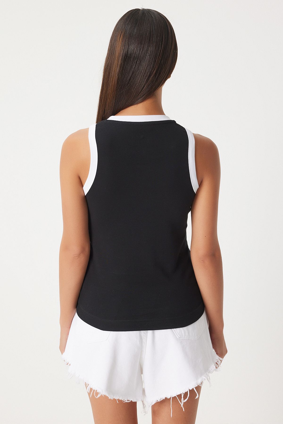 Female black sleeveless contrast colored blouse FK00010