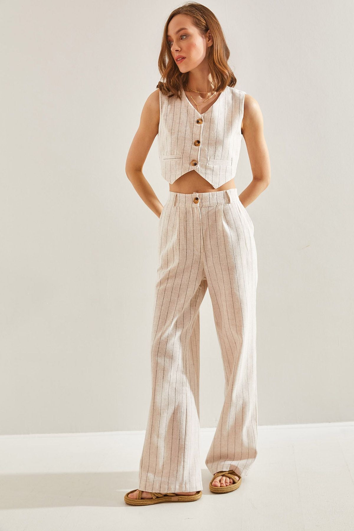 Blower with a woman striped vest
