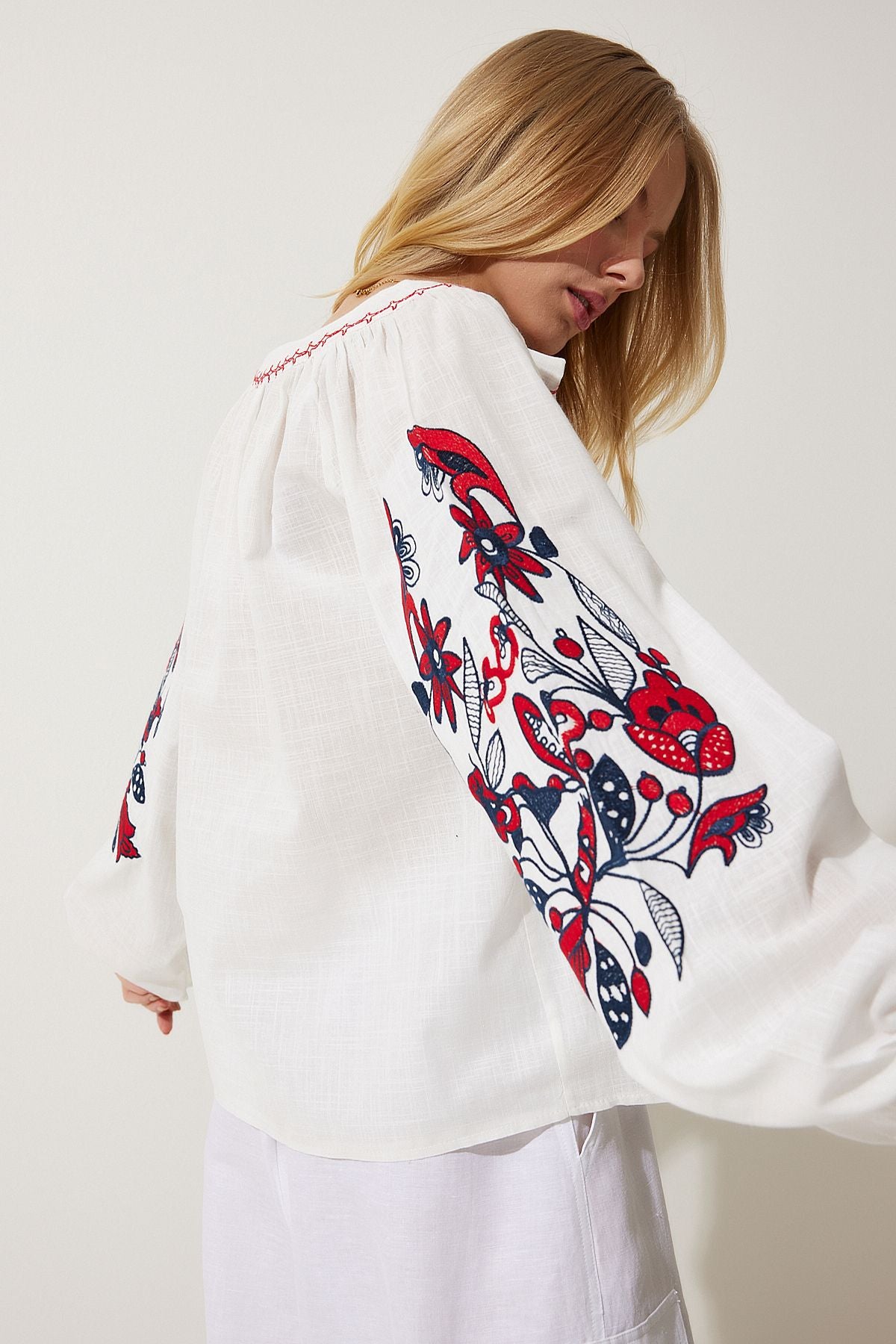 Female white embroidered button flax blouse es00151