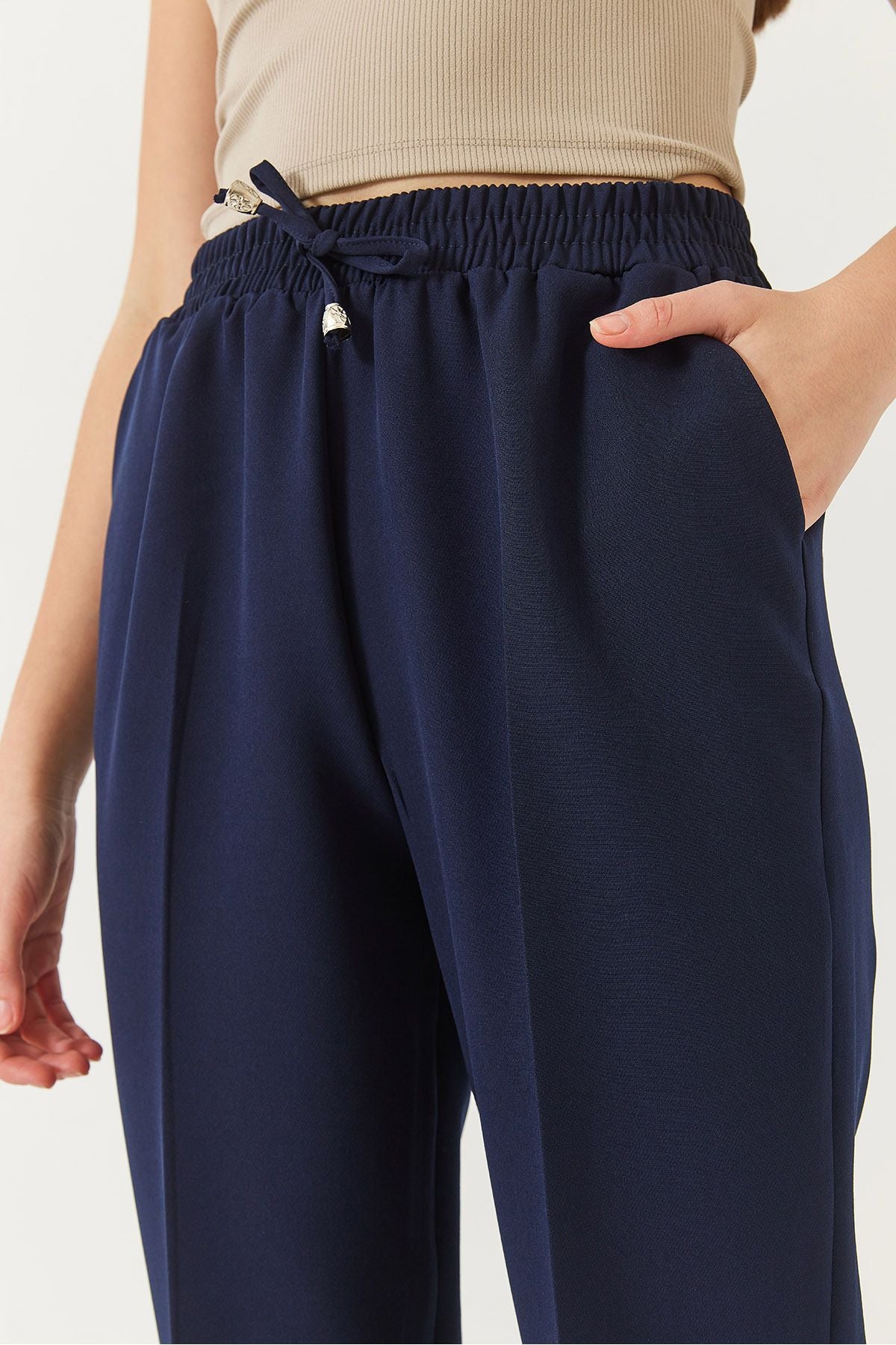 Carrot slaughter pants with double pockets with a woman waist rubber 80178 60271079