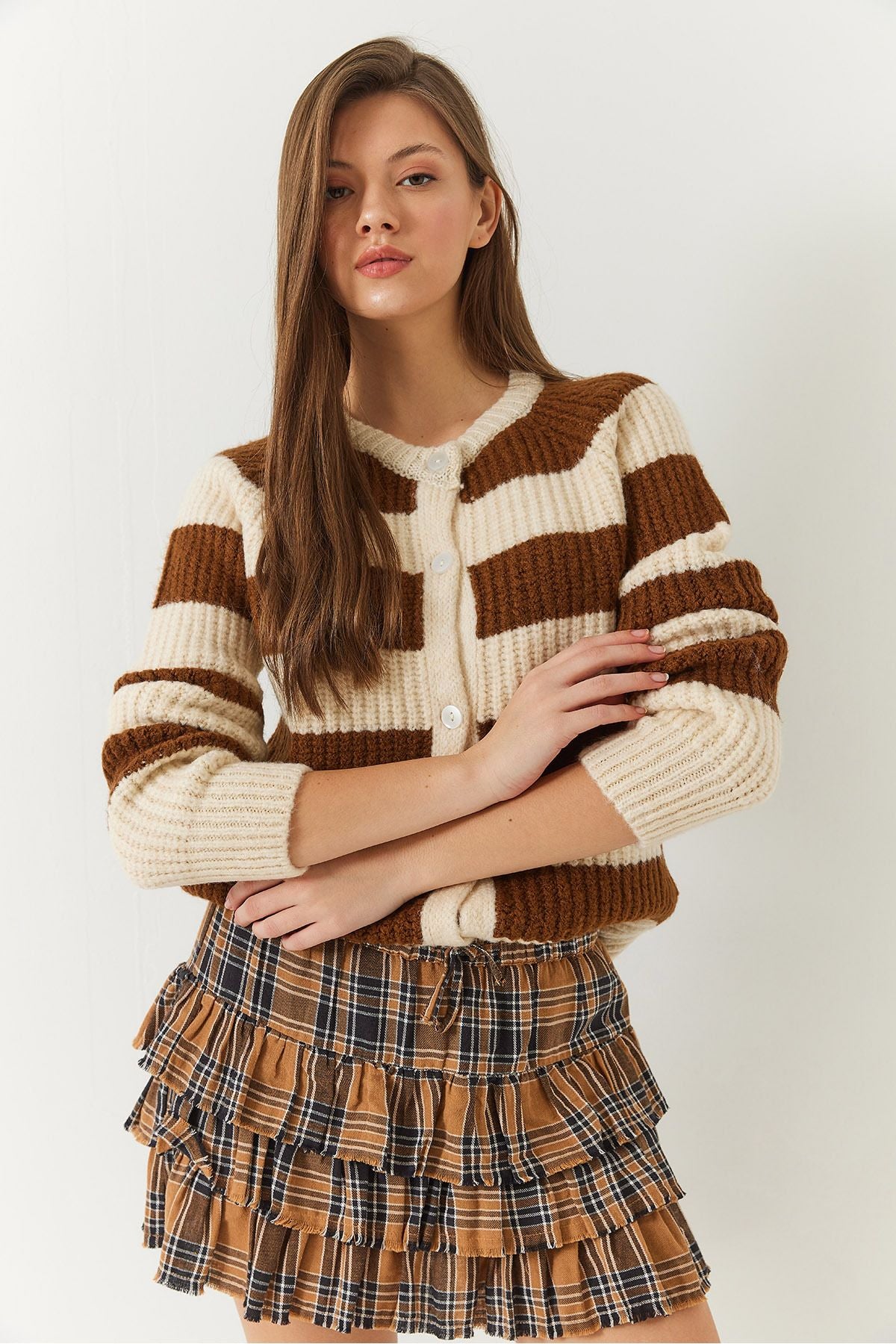 Female striped buttoned knitwear cardigan