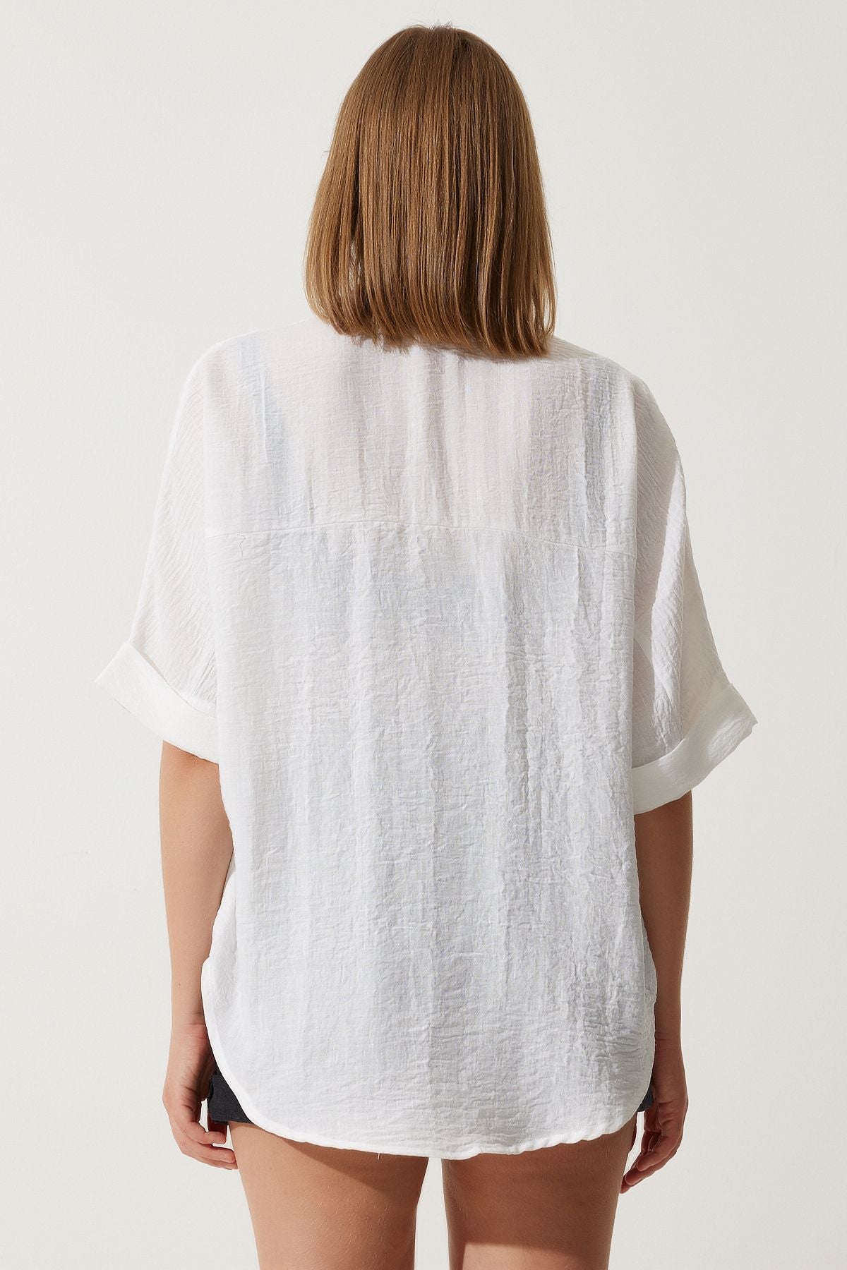 Female white embroidery pocket overwheel
