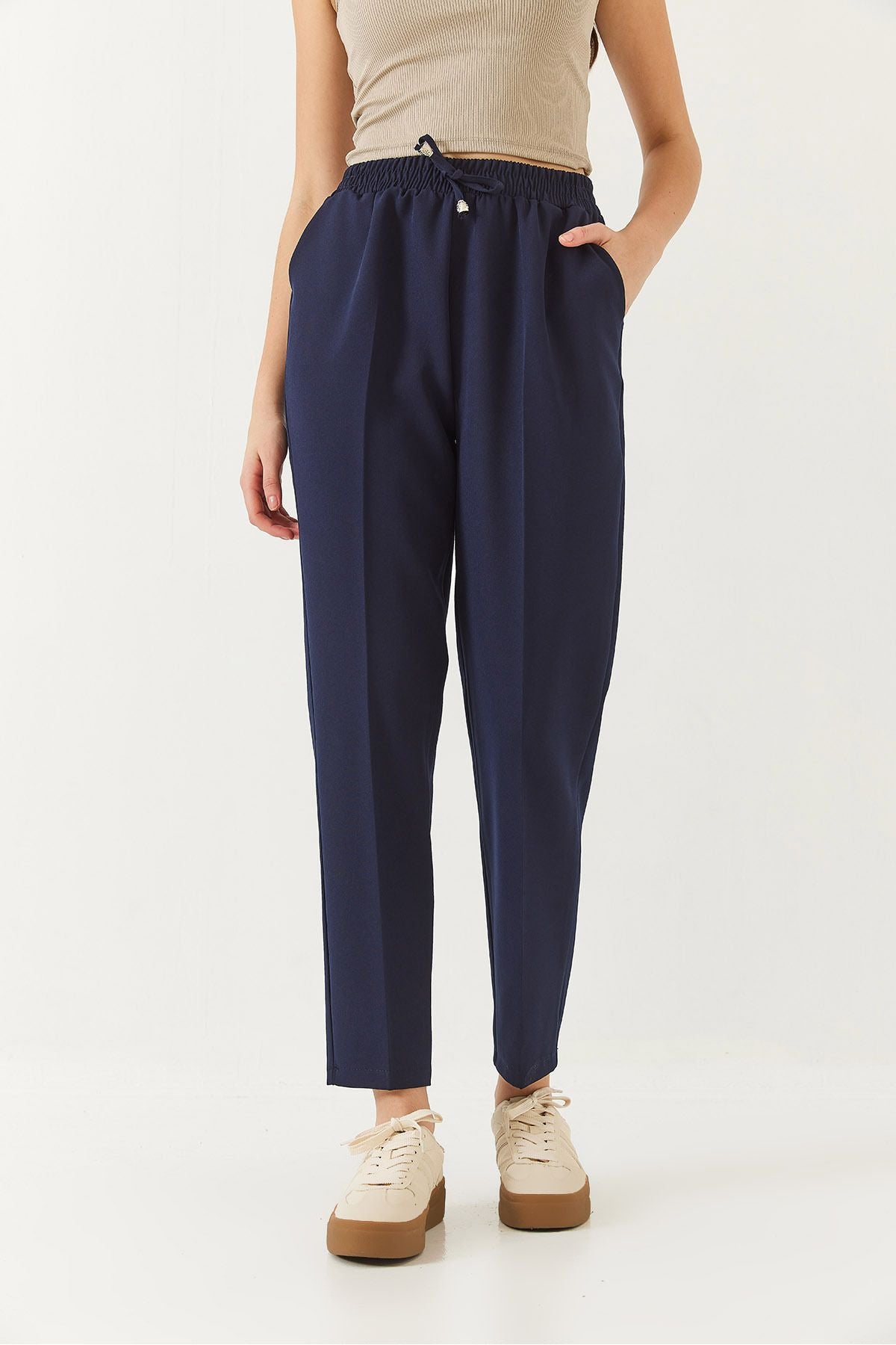 Carrot slaughter pants with double pockets with a woman waist rubber 80178 60271079