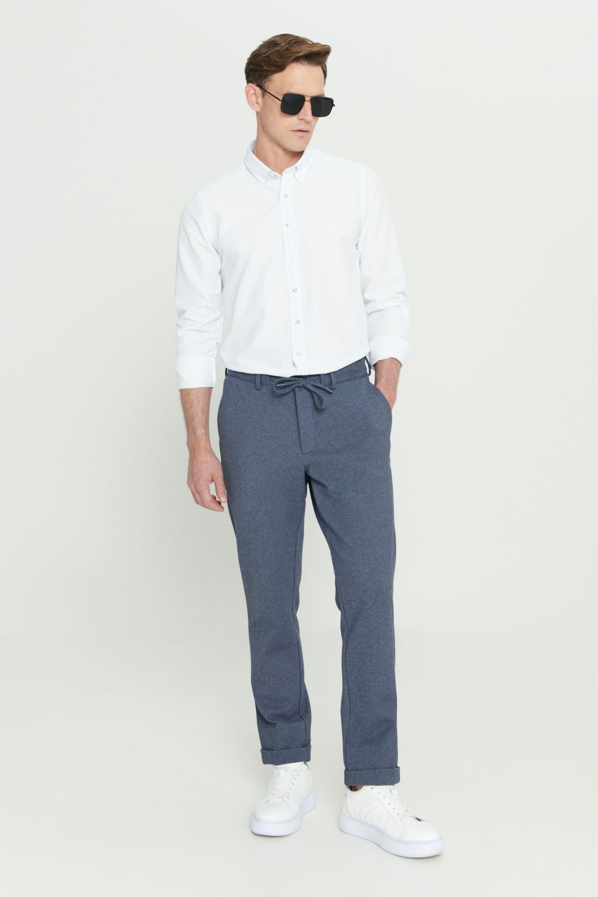 Men's navy blue slim fit narrow cut waist tied flexible pants