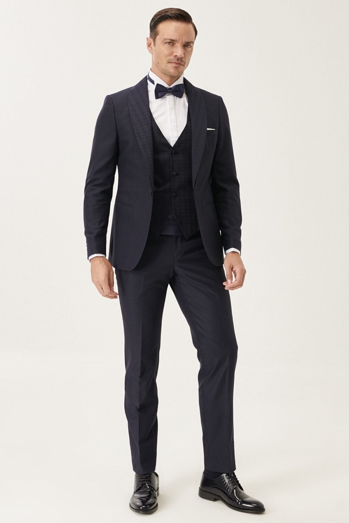 Men's navy blue extra slim fit tight -cut vest with patterned tuxedo grooming