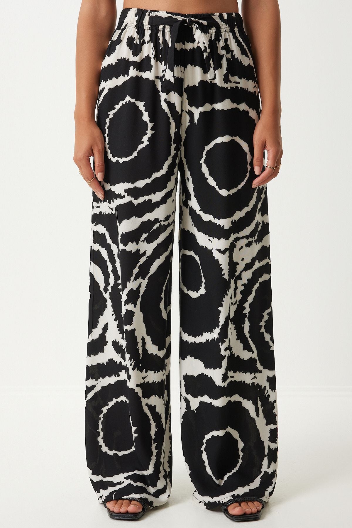 Female black light cream pattern draped viscose palazzo pants EN00606