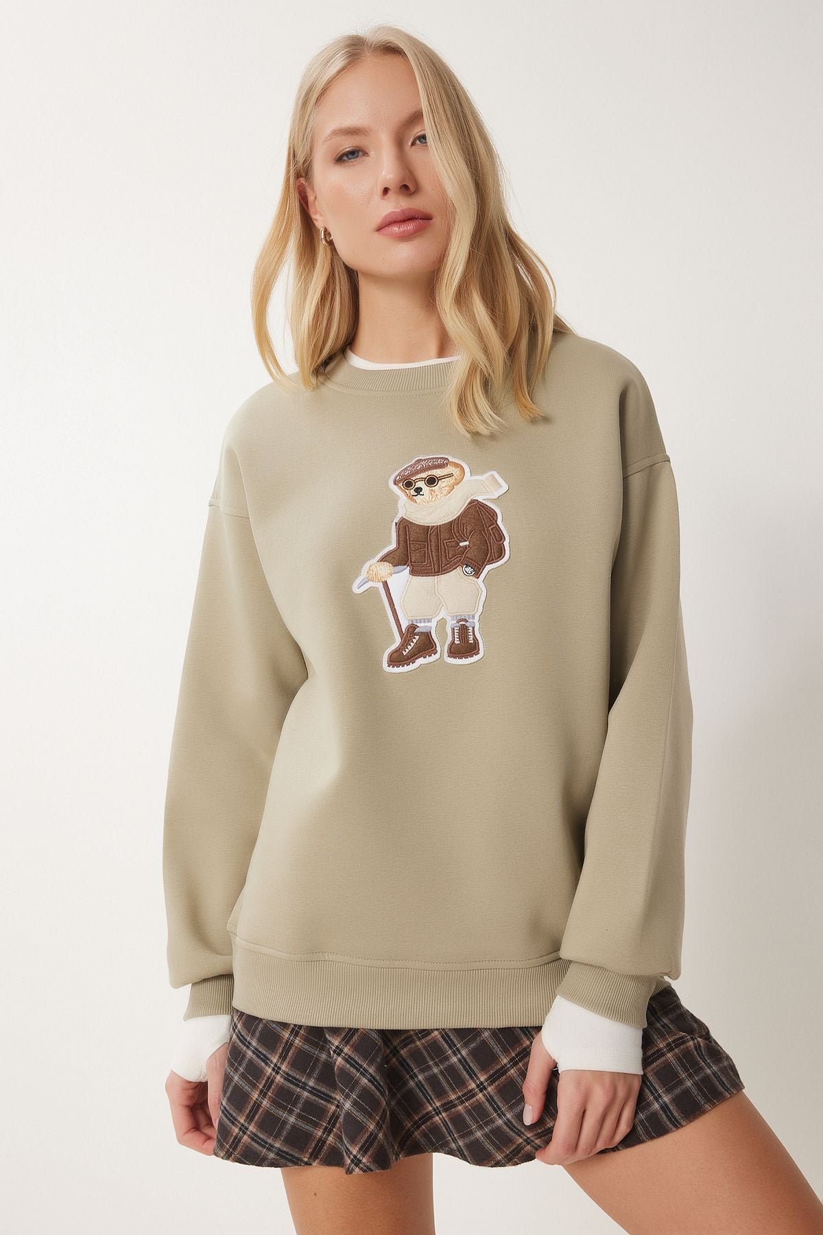 Women's clay green teddy bear armed