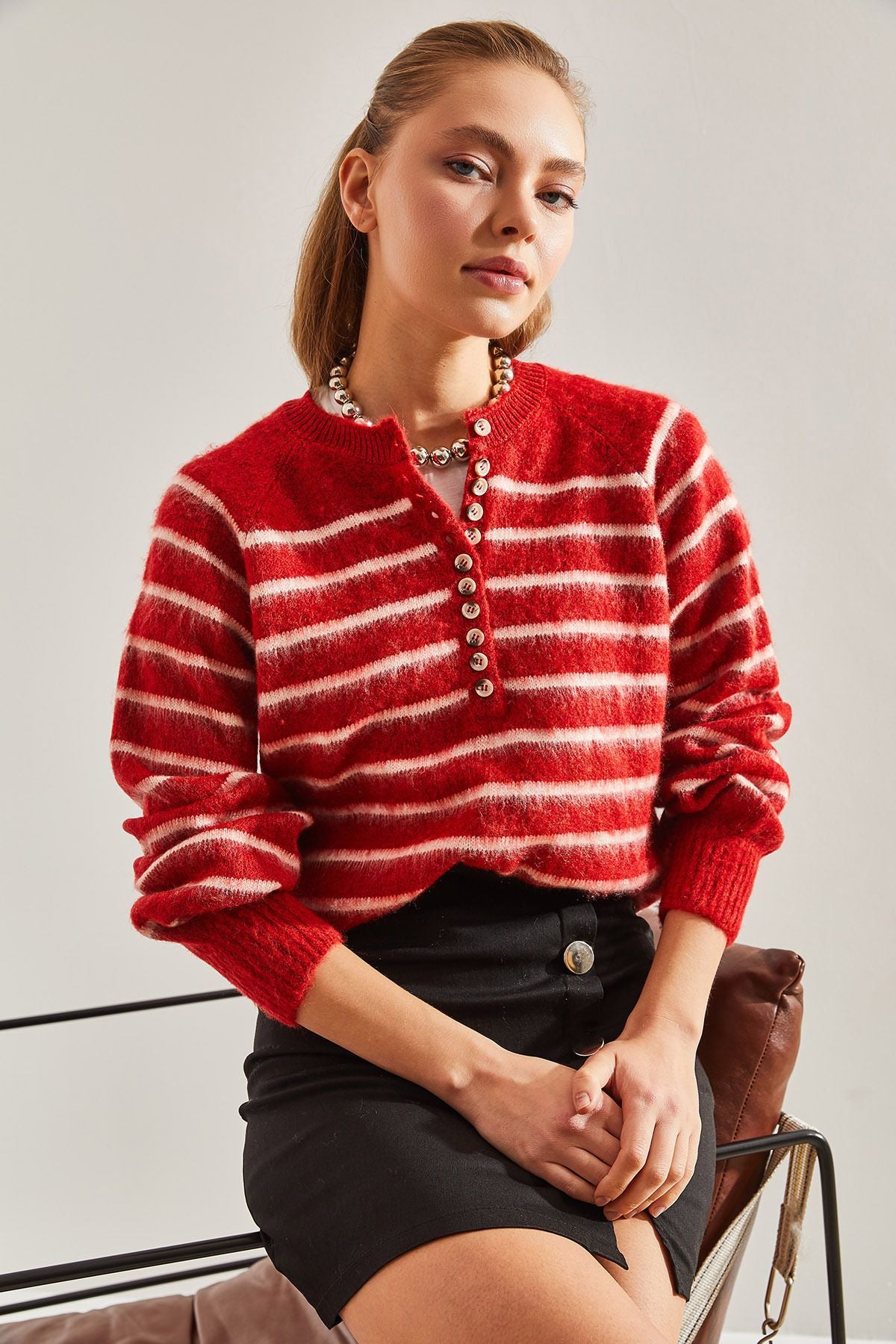 Female Shardon striped 11 button knitwear sweater