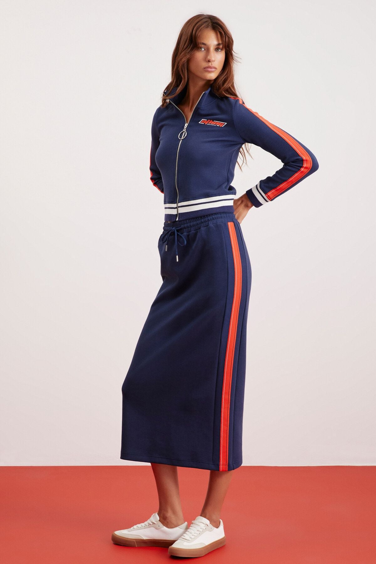 Odette female thick textured side strip detailed waist tire midi size navy blue skirt