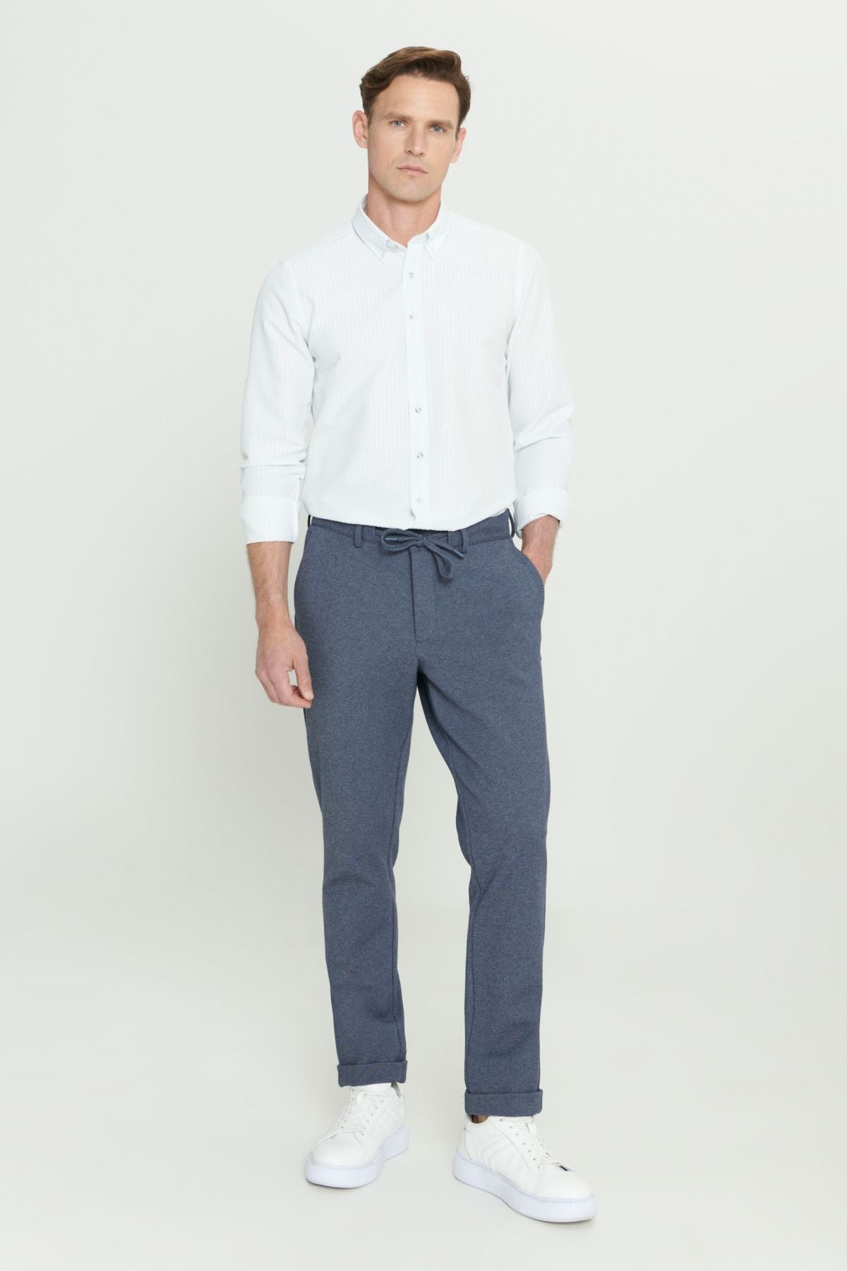 Men's navy blue slim fit narrow cut waist tied flexible pants