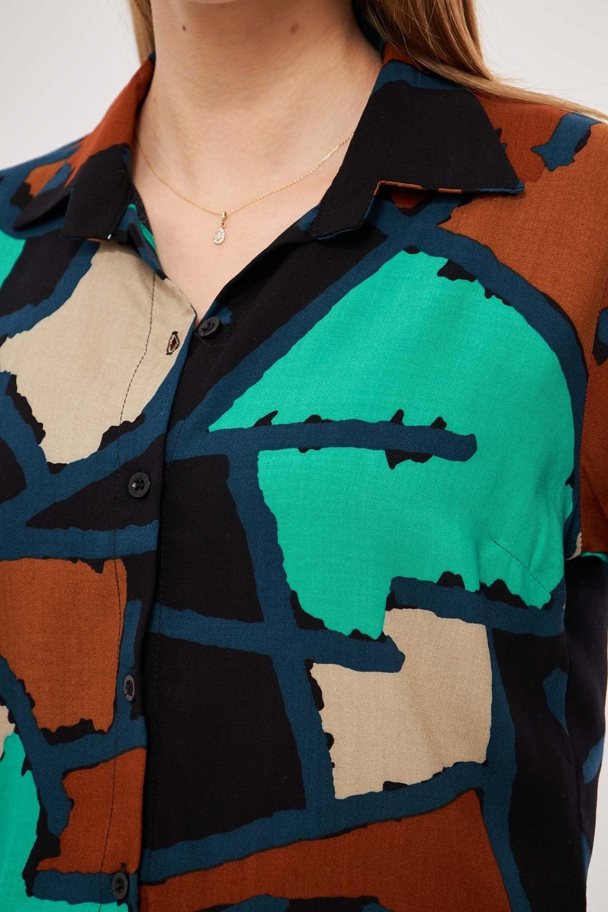 Female turquoise patterned long arm shirt ARM-25K001040
