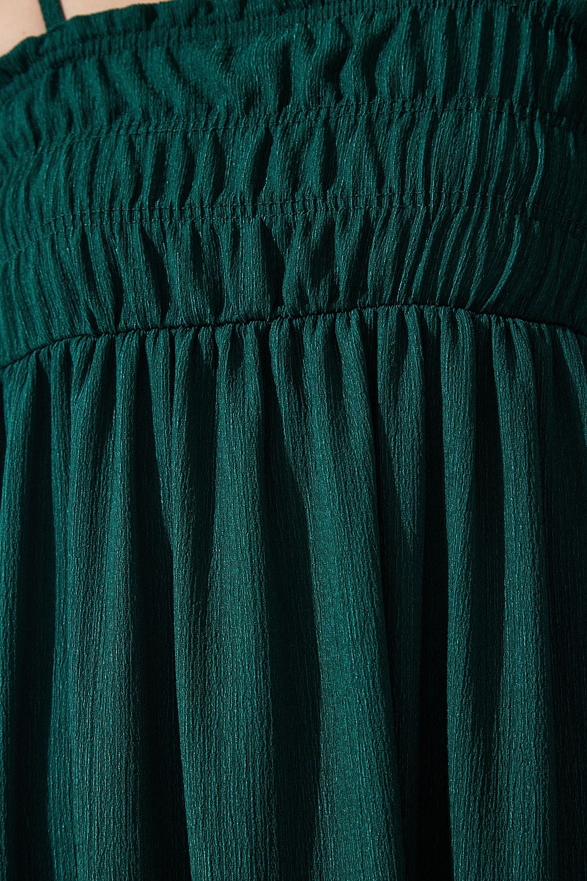 Female emerald green hanger