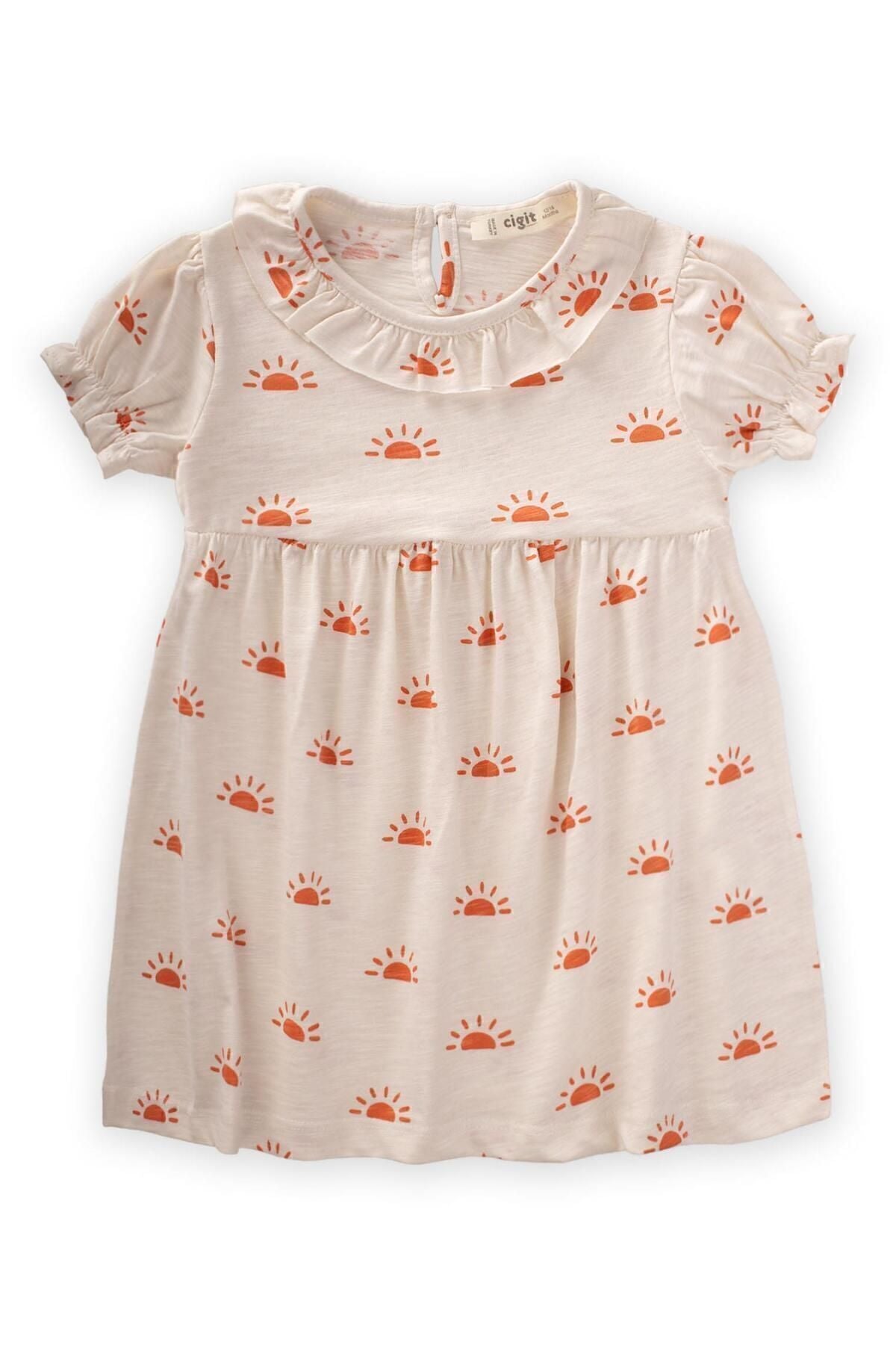 Patterned dress 1-6 age ecru sun pattern