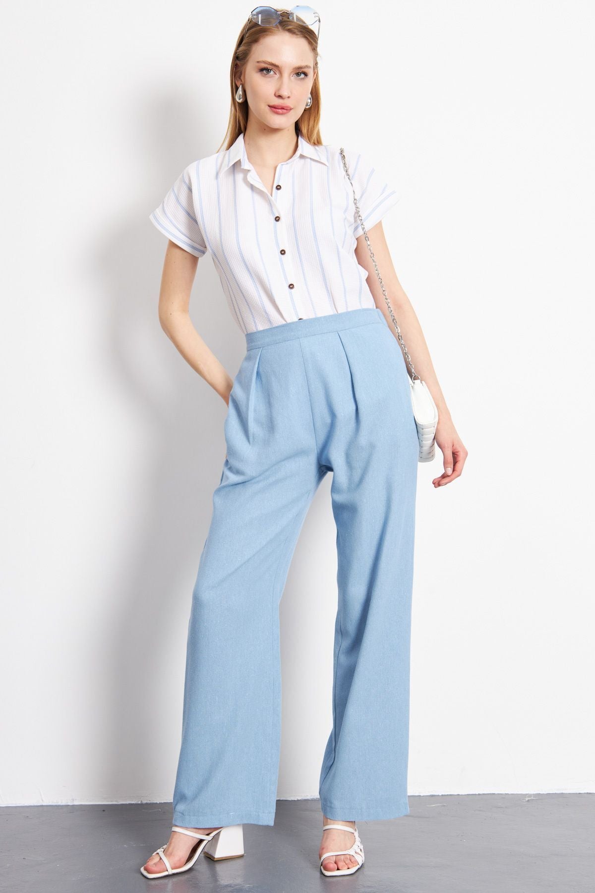 Woman Baby Blue Linen-looking pocket Palazzo Trousers ARM-24Y001070