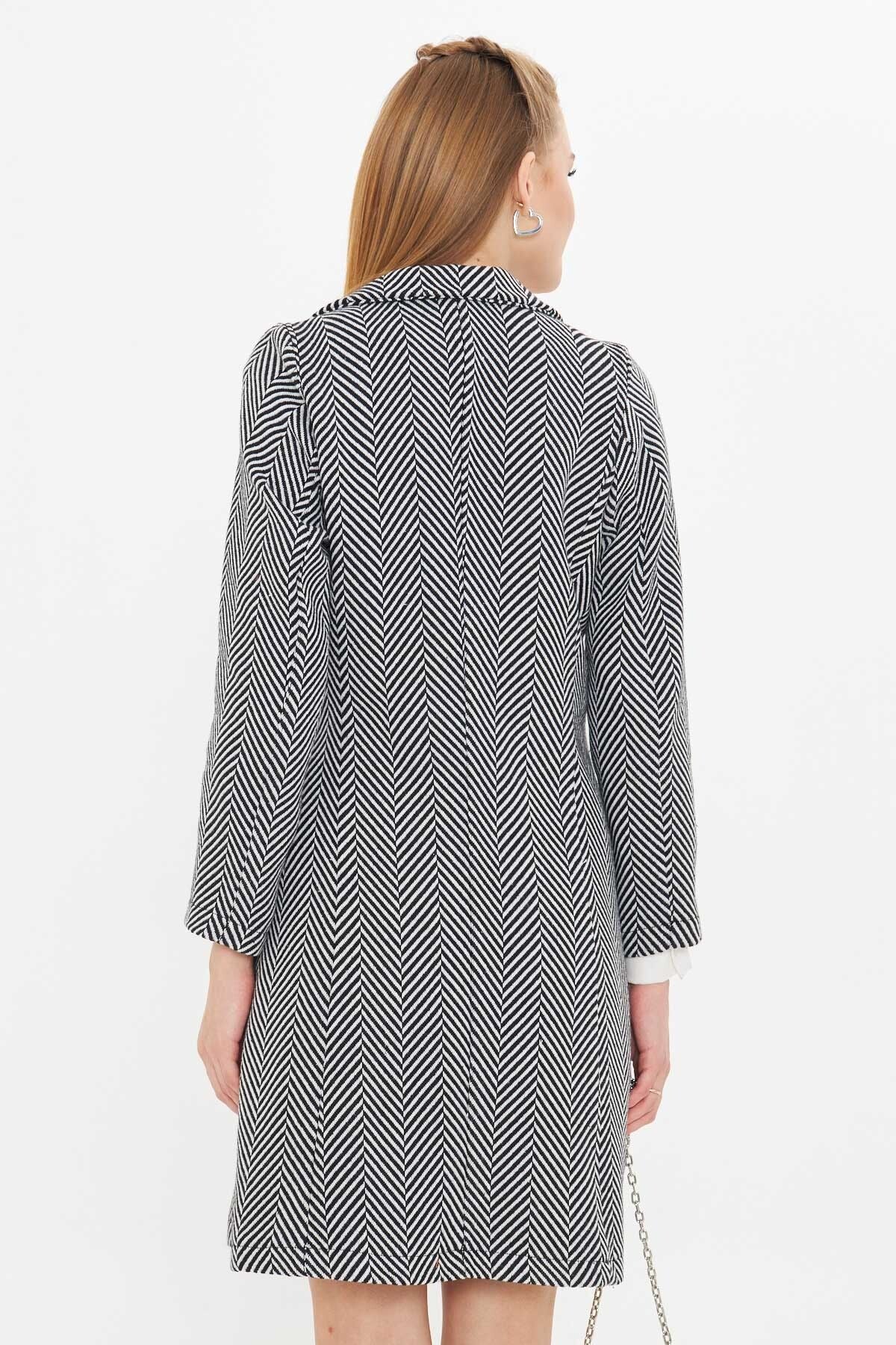 Women's black side-tied pocket long stamp coat with striped pockets ARM-25K001077