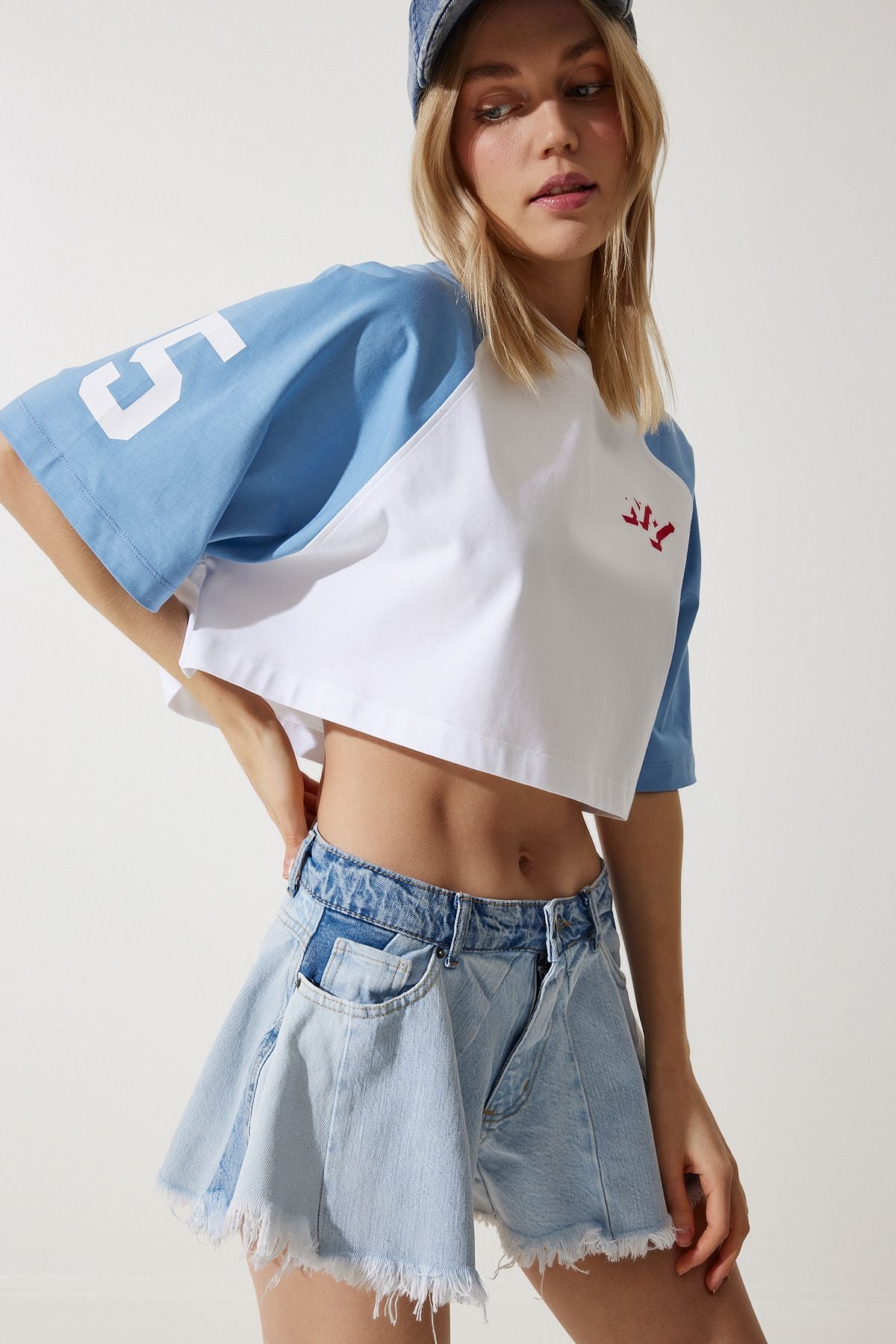 Women's ice blue tassel mini denim shorts he00002