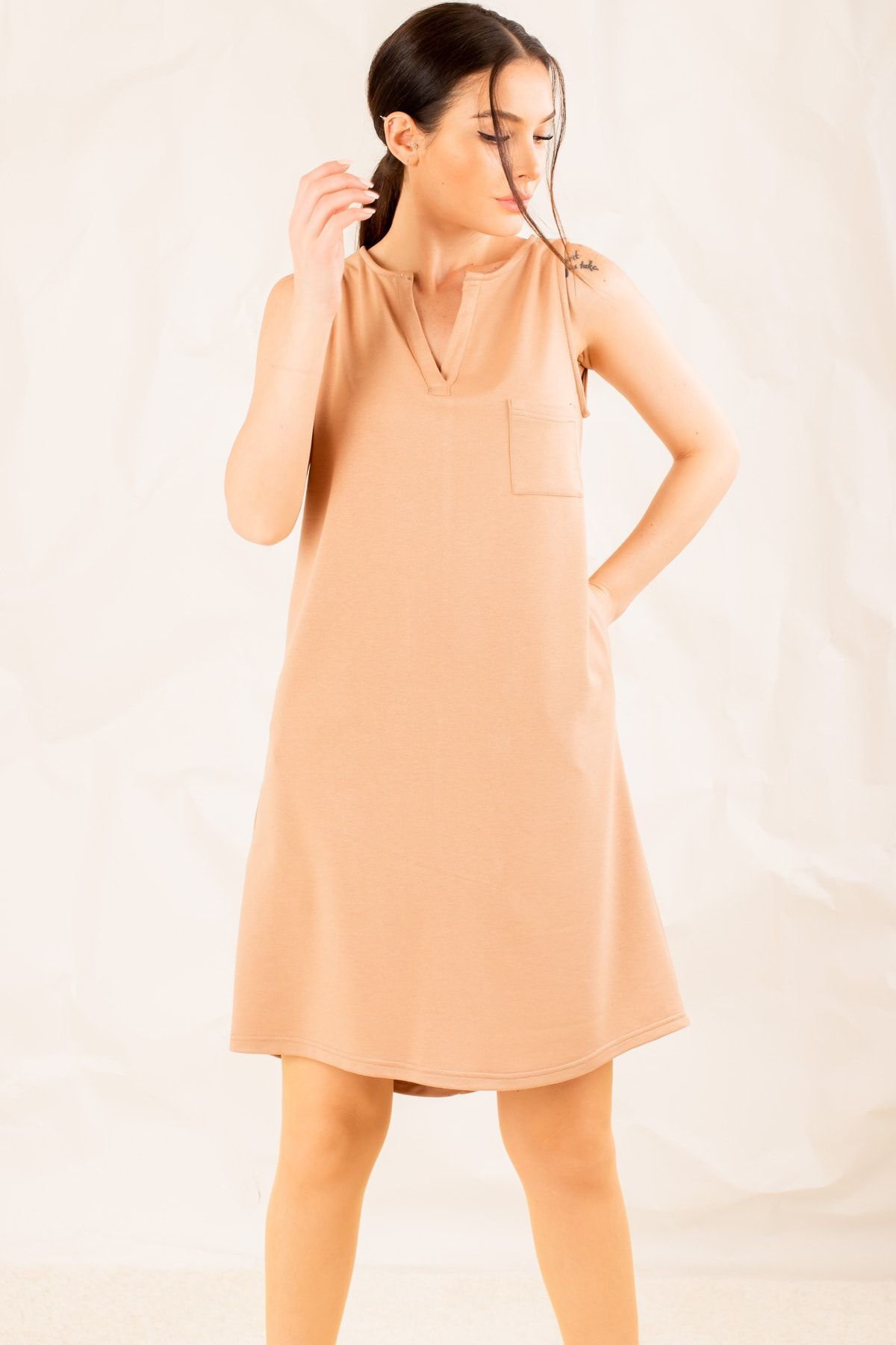 Female beige pocket midi size dress arm-19y001122