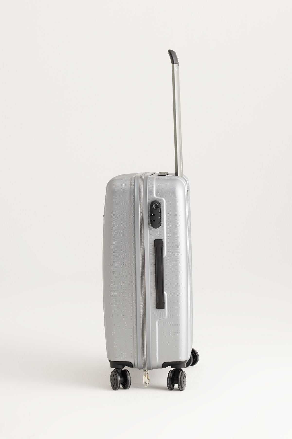 Gray medium size suitcase