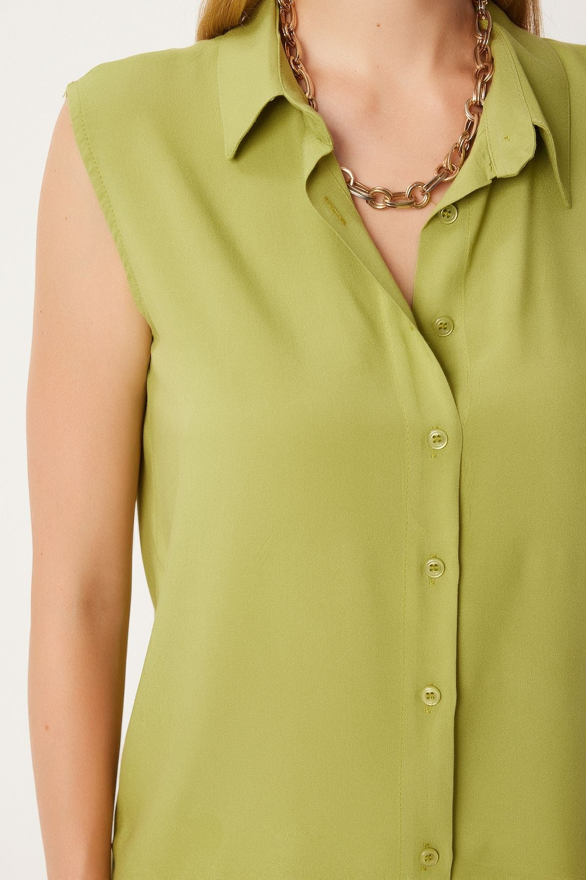 Female peanut green sleeveless viscose shirt to00129