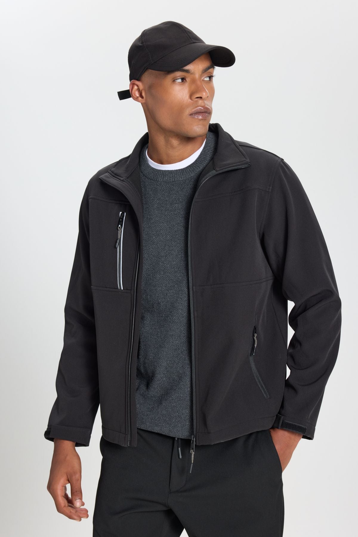 Men's black softshell standard fit normal cut upright collar zipper jacket with side pockets