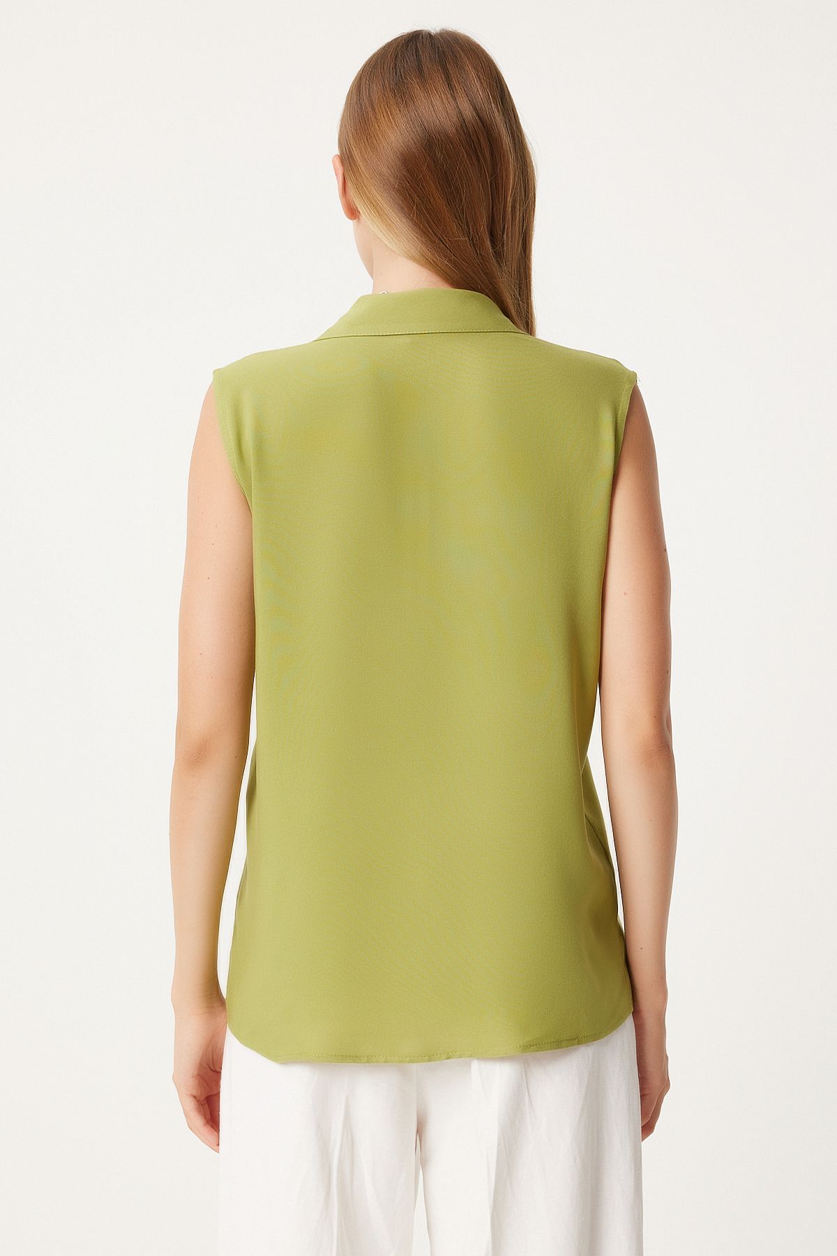 Female peanut green sleeveless viscose shirt to00129