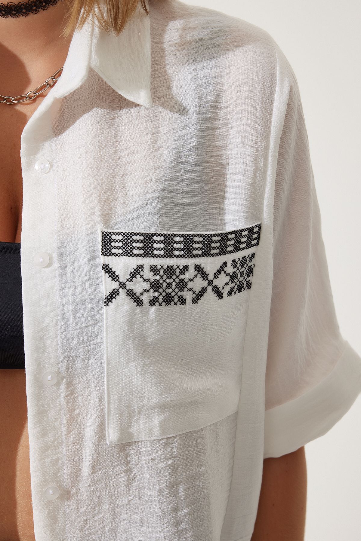 Female white embroidery pocket overwheel