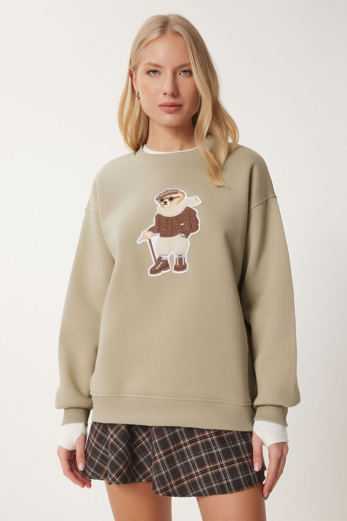Women's clay green teddy bear armed