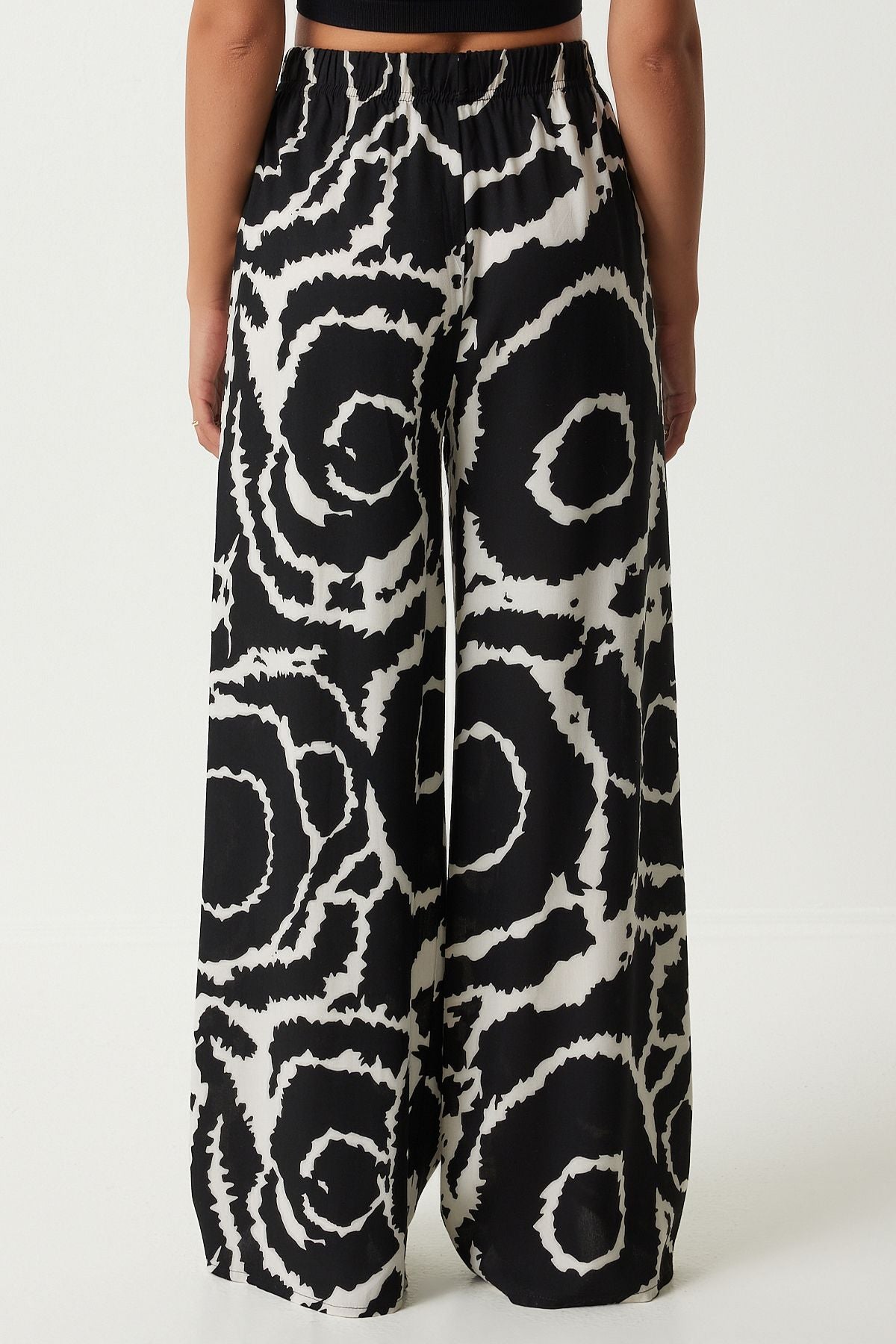 Female black light cream pattern draped viscose palazzo pants EN00606